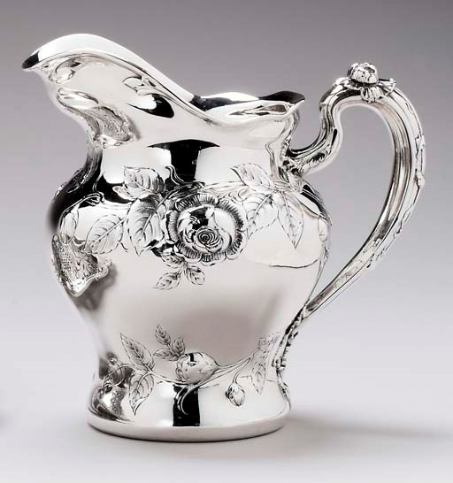 A SILVER WATER PITCHER