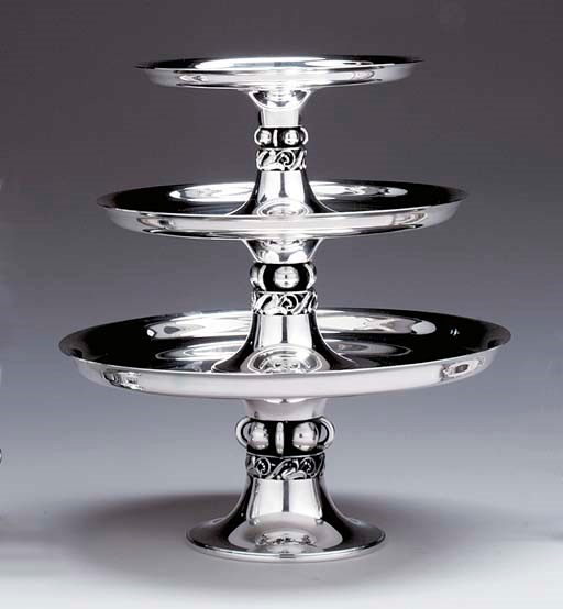 A SET OF THREE SILVER STACKING COMPOTES