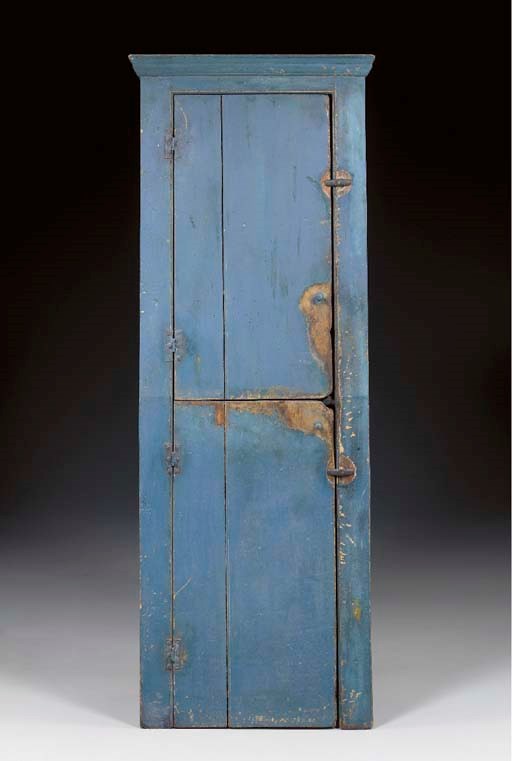 A BLUE-PAINTED SLANT BACK TWO DOOR CUPBOARD