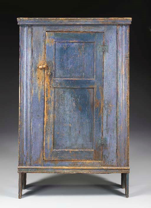 A BLUE-PAINTED PANELED CUPBOARD