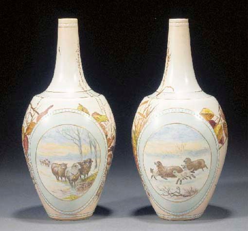 A pair of Doulton Lambeth Carara vases