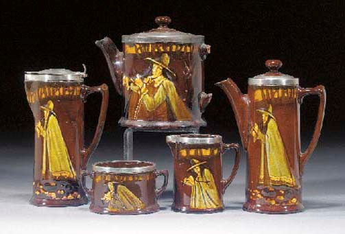 A Royal Doulton Kingsware tea and coffee set with silver detailing