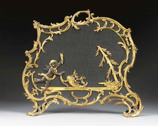 A Louis XV style ormolu and patinated bronze firescreen,