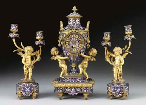 A French ormolu and champleve enamelled three-piece clock garniture