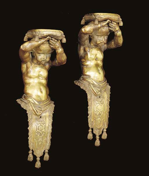 A pair of French bronze figural mounts