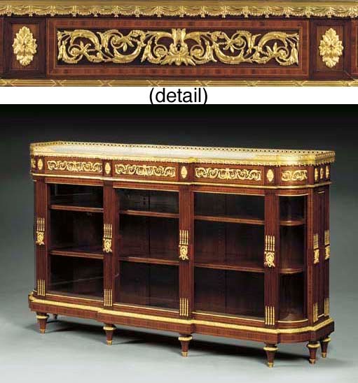 A Napoleon III ormolu-mounted mahogany and amaranth vitrine cabinet