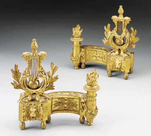 A pair of Louis XVI style ormolu chenets