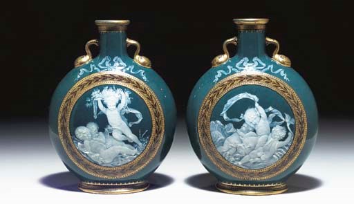 A PAIR OF MINTONS PÂTE-SUR-PÂTE PEACOCK-BLUE GROUND TWO-HANDLED PILGRIM BOTTLES EMBLEMATIC OF 'WATER' AND 'EARTH'
