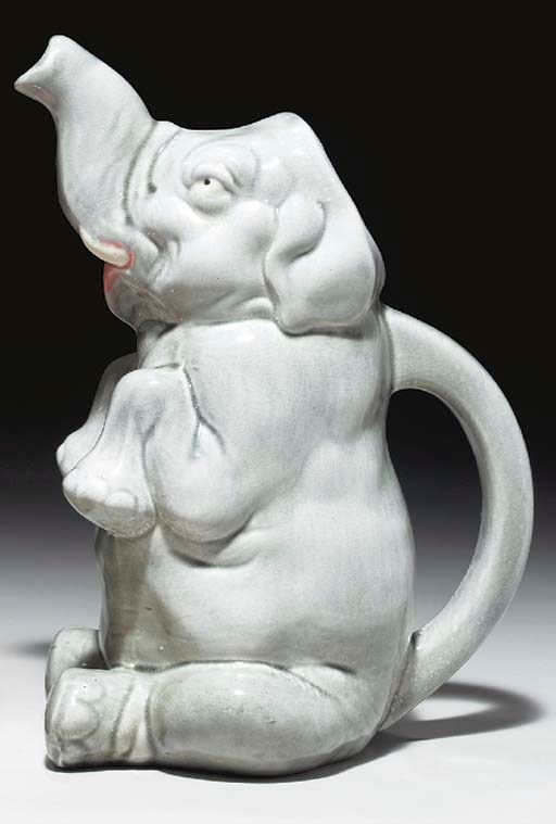 A SARREGUEMINES MAJOLICA ELEPHANT JUG