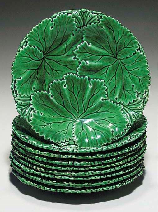 NINE W.T. COPELAND & SONS MAJOLICA GREEN-GLAZED VINE-LEAF MOULDED PLATES