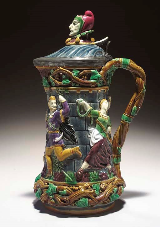 A PEWTER-MOUNTED MINTON MAJOLICA 'TOWER' JUG,