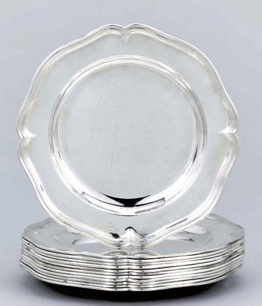 A set of twelve German silver dinner-plates
