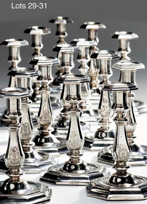 Two similar German silver candlesticks