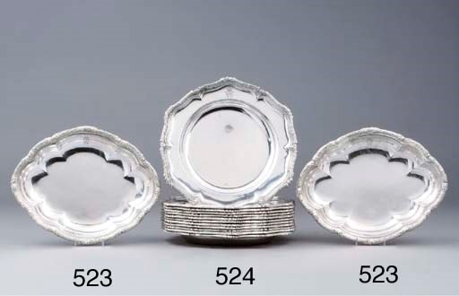 A set of twelve German silver serving-dishes