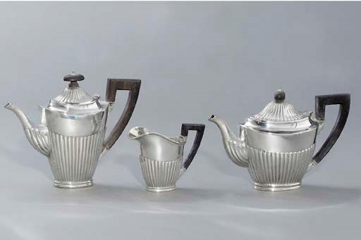A German silver coffee-pot, teapot and cream-jug