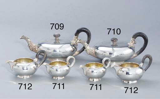 A pair of German silver cream-jugs