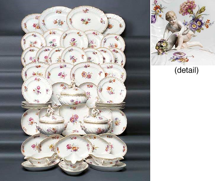 A substantial part of a Berlin (K.P.M.) porcelain Neuozier moulded dinner-service