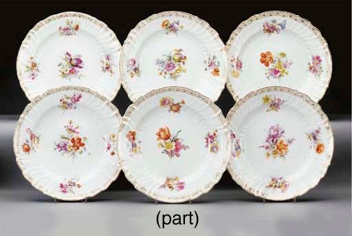 Twelve Berlin (K.P.M.) porcelain Neuozier dinner-plates