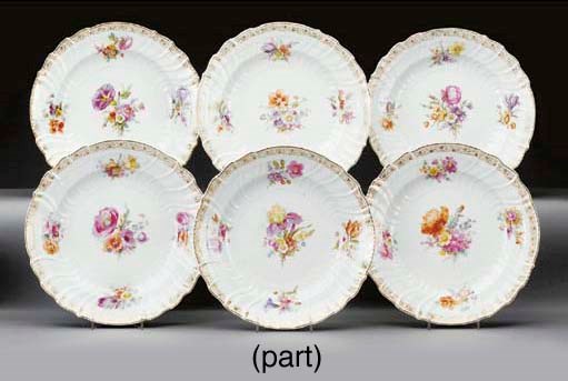Twelve Berlin (K.P.M.) porcelain Neuozier dinner-plates