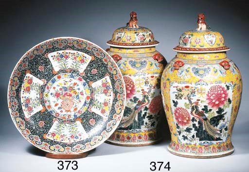 A pair of famille rose baluster jars and covers