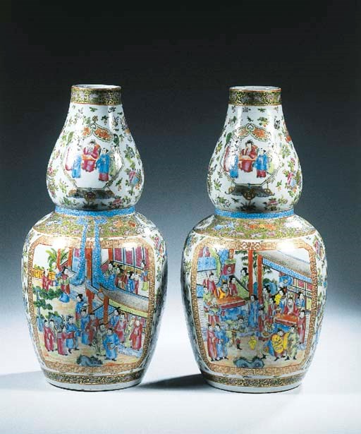 A pair of Canton famille rose double gourd vases