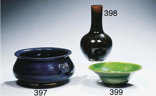 A green-glazed ogee bowl