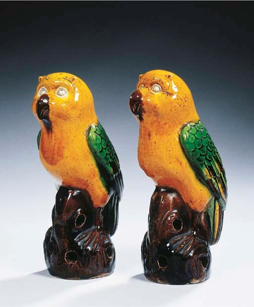 A rare pair of sancai-glazed models of owls
