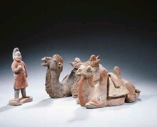 Two grey pottery figures of a camel and a groom