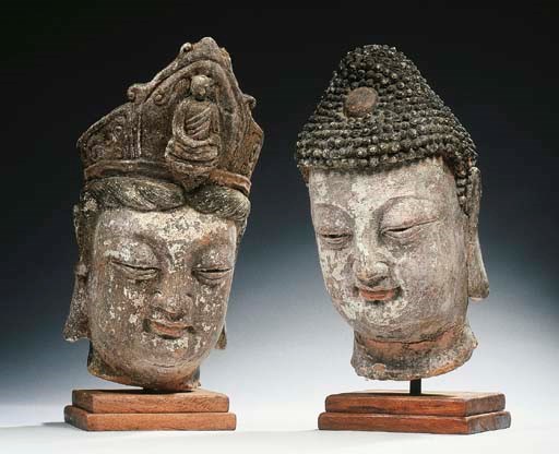 A stucco head of Buddha Shakyamuni and Guanyin