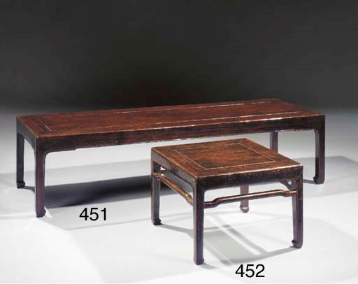A black lacquered side table