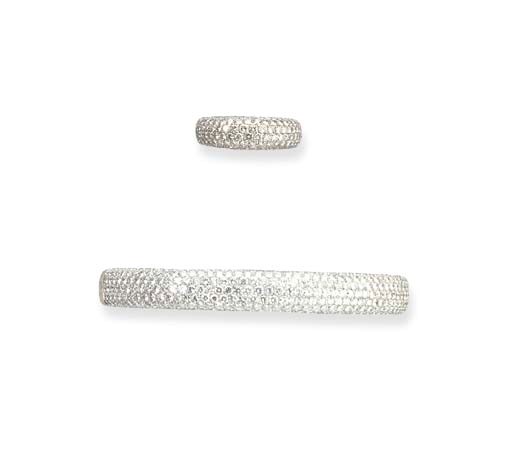 A DIAMOND BANGLE WITH RING