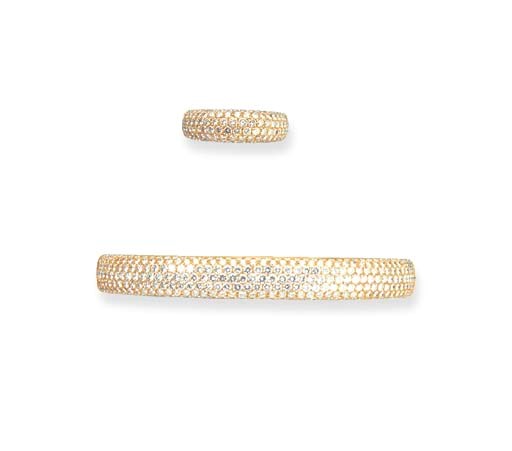 A DIAMOND BANGLE WITH RING