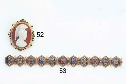 A GOLD AND GEM SET NEO-GOTHIC BRACELET