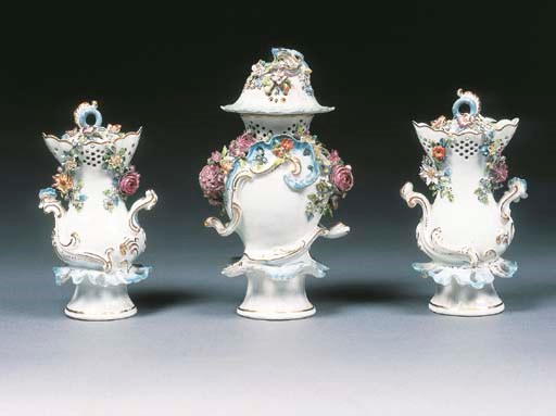 A garniture of three Derby pierced pot-pourri vases and three covers