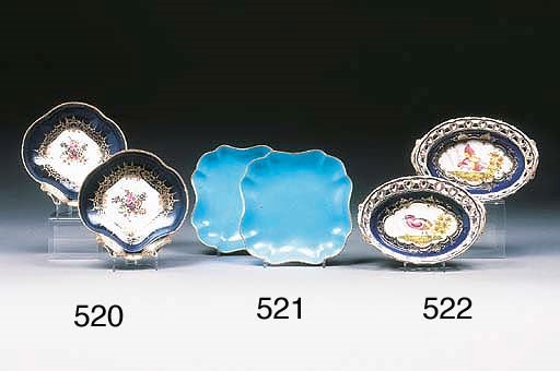 A pair of English porcelain blue-scale pierced oval two-handled baskets