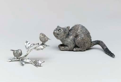 AN ITALIAN SILVER CAT AND BIRDS,