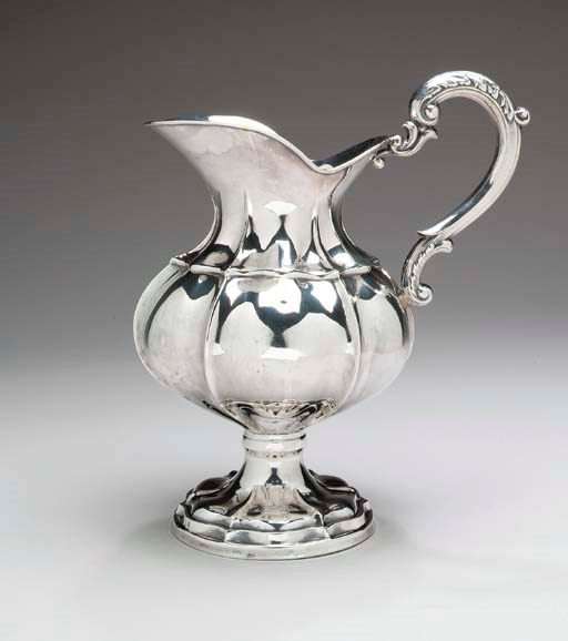 A SPANISH SILVER WATER PITCHER,
