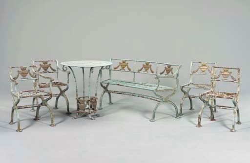 A SUITE OF GREEN-PAINTED CAST-IRON GARDEN FURNITURE,