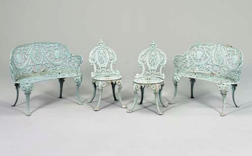 A SUITE OF GREEN-PAINTED CAST-IRON GARDEN FURNITURE,