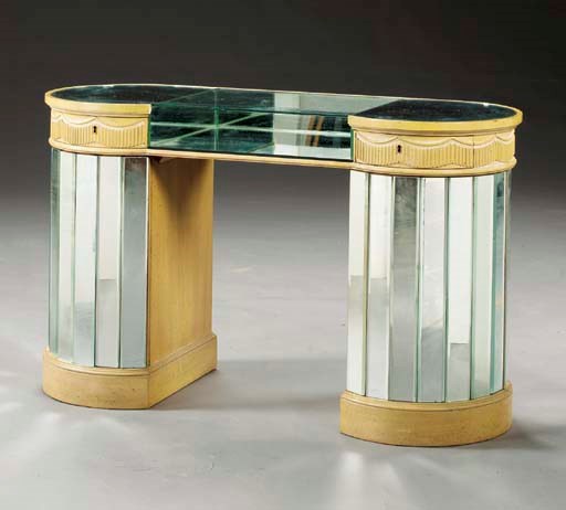 A MIRRORED AND CREAM-PAINTED DRESSING-TABLE,