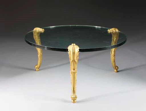 AN ORMOLU AND GLASS CENTER TABLE,
