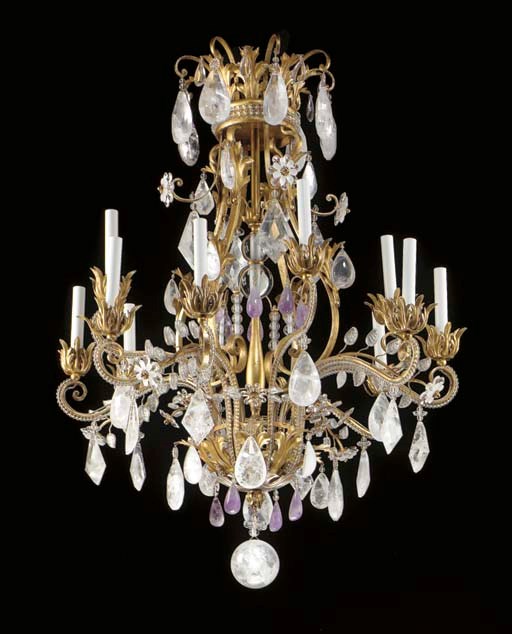 A LOUIS XV STYLE GILT-METAL, GLASS, ROCK CRYSTAL AND AMETHYST TWELVE-LIGHT CHANDELIER,