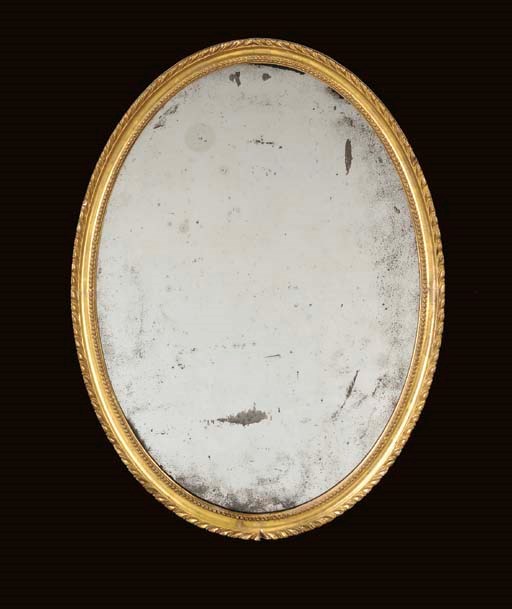 A GEORGE III GILTWOOD MIRROR,
