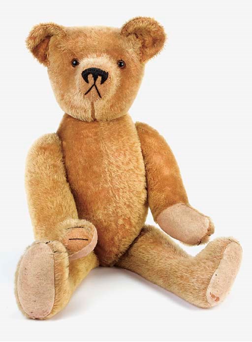 A golden mohair teddy bear