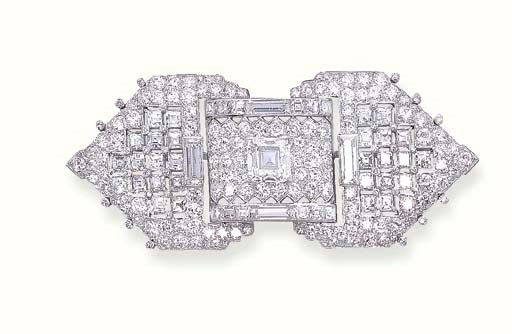 AN ELEGANT ART DECO DIAMOND BROOCH, BY CARTIER