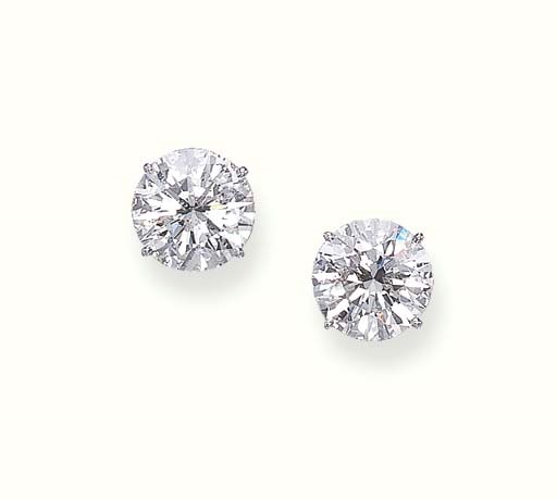 A PAIR OF CIRCULAR-CUT DIAMOND EAR STUDS