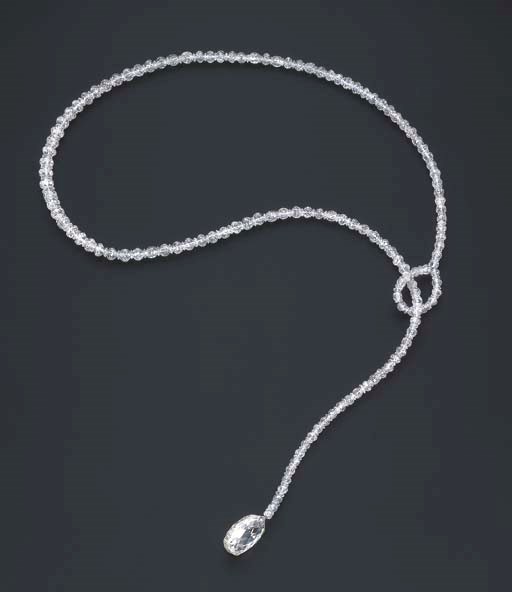 AN ELEGANT DIAMOND BEAD LARIAT NECKLACE