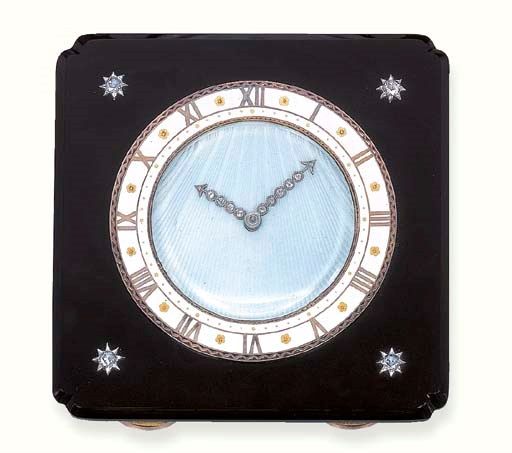 AN ART DECO ONYX, ENAMEL AND DIAMOND DESK CLOCK, BY CARTIER