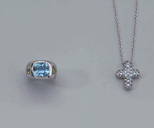 A WHITE GOLD BLUE TOPAZ RING AND PENDANT