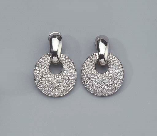 A PAIR OF WHITE GOLD AND DIAMOND EAR CLIPS